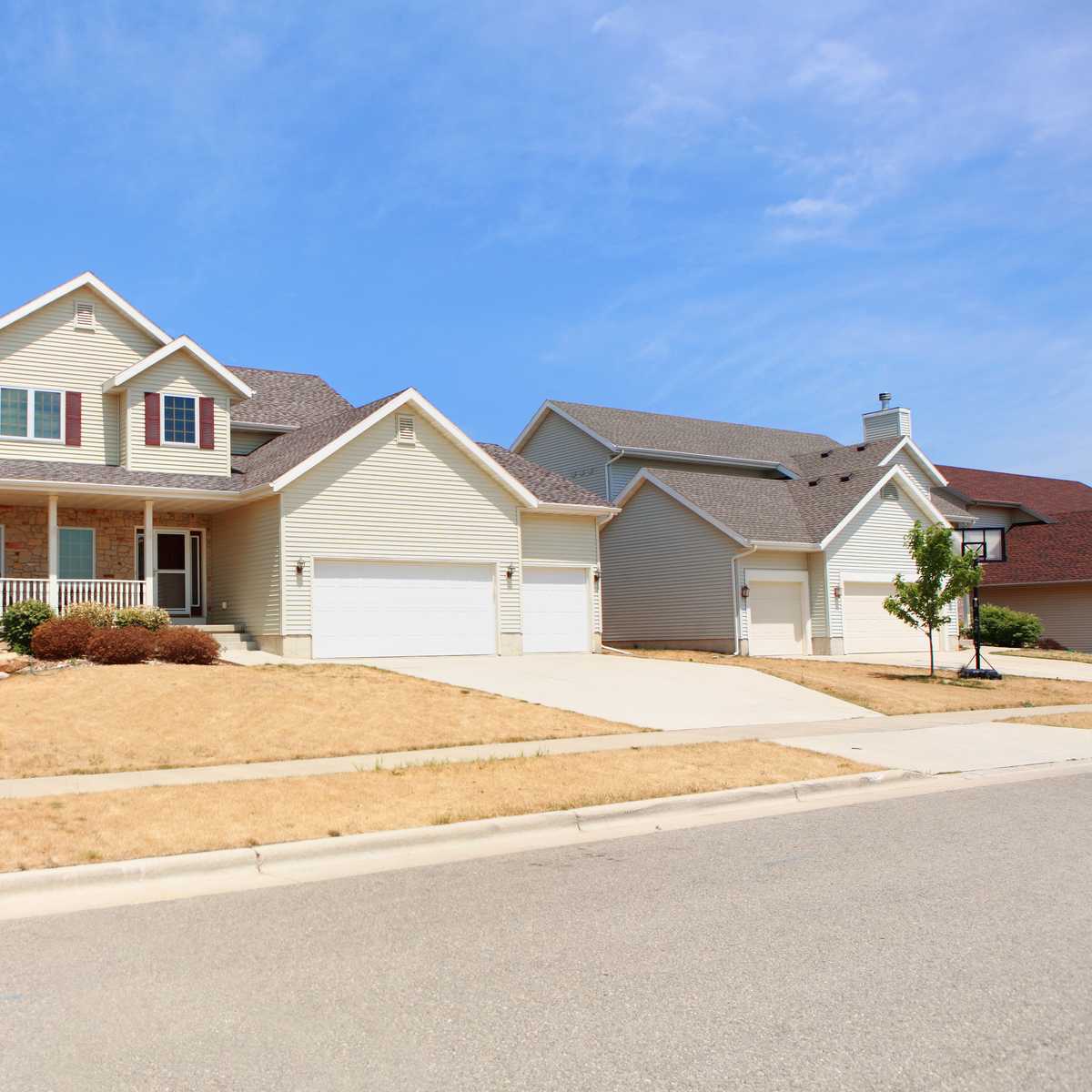 House with brown grass